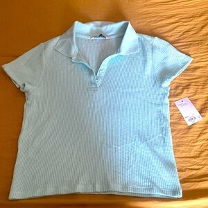 Still tagged! Sea foam short sleeved knit shirt. Junior large.